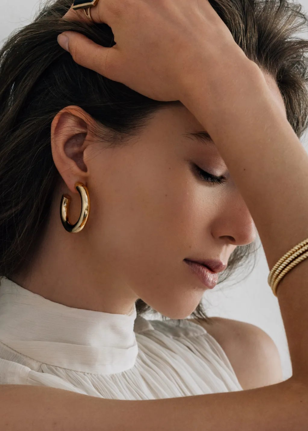 Elegant handcrafted hoops and bangles from Lolo Jewellery, blending modern design with timeless style. Bardot Hoops Gold